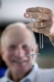 Ron's cross ministry: Shalimar man races health to craft 5,000 necklaces