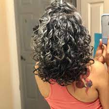 Rhiannon Grey And Loving It Curly Silver Hair Grey Curly Hair Grey Hair Color