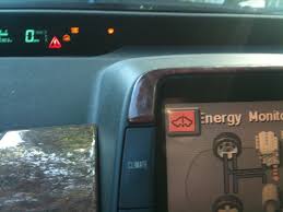 Here is some wisdom after fixing warning: Red Triangle Check Icon And Problem Followed By Red Car Icon On Screen Help Priuschat