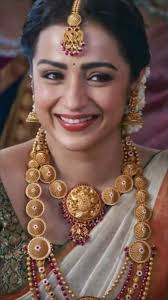 9 Stylish Trisha Krishnan Inspired White and Golden Sarees For Onam 2024