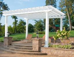 Classic pergolas can also be doubled up to create a delightful display of woven cedar wood. A Classic Pergola Design Makes This Brown Jordan Structure A Timeless Addition To Any Outdoor Living Space This Fi Patio Garden Design Pergola Designs Pergola