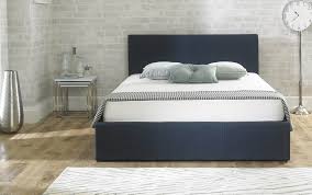 Ottoman beds feature large underbed compartments which offer practical storage solutions without sacrificing style. Stirling Fabric Ottoman Bed Chambray Blue The Haven Home Interiors