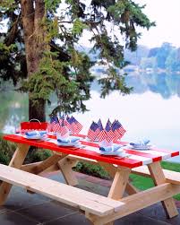 This table has for a centerpiece a mock drum which is a combination of stiff cardboard, scarlet crepe paper, gilt paper and cord. The Best Memorial Day Decorations And Party Ideas Martha Stewart