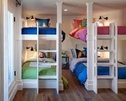 Interior designer lauren leonard placed two sets of bunk beds side by. Neutral Kids Room With Multiple Bunk Beds Kids Bunk Beds Shared Kids Room Kid Beds