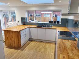 Dove grey kitchen with wood worktop ukc message board. Phoenix Joinery On Twitter Soho Matt Dove Grey Handleless Kitchen With Solid Oak Worktops And Petrol Blue Alusplash Splash Back Designed Supplied And Fitted By Phoenix Joinery Oak Kitchendesign Worktops Grey Matt Https T Co 0raec6ynvm