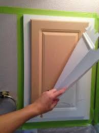 How to add trim and paint your laminate cabinets brepurposed. Painting Laminated Cabinets How To Repair And Paint Them Theraggedwren Blogspot Com Laminate Cabinets Laminate Kitchen Cabinets Painting Kitchen Cabinets