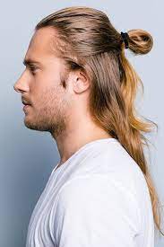 The top knot hairstyle is a perfect choice for men with long hair, preferably those that stretch to the shoulders and beyond. The Top Knot Guide What Is It And How Can You Wear It