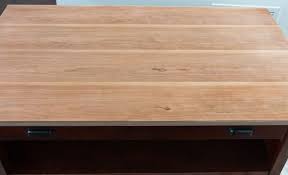 To refinish a coffee table, start by sanding off the old finish. Refinished Coffee Table Heart Filled Spaces
