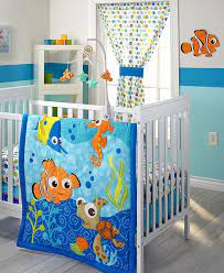 The set includes an embroidered comforter, a striped crib skirt, and a scatter print sheet with a blue, green, white, and orange color palette. Disney Finding Nemo Baby Bedroom Collection Reviews Bedding Collections Bed Bath Macy S
