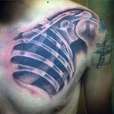 70 Bone Tattoo Designs For Men Skeletal Ink Ideas Tattoo Designs Men Cover Up Tattoos For Men Cool Chest Tattoos