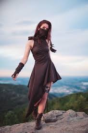 She can deal critical hit damage of 200% to all enemies and over a broader area. Desert Walker Dress Dusk Mask Hoodie Dress Elven Forest Etsy Festival Outfits Burning Man Costume Fashion