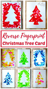 Kid made gifts and keepsake craft ideas make gift giving easy! Reverse Fingerprint Christmas Tree Cards Christmas Tree Cards Diy Christmas Cards Xmas Crafts