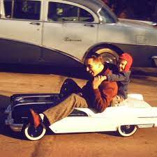 1956 Pontiac Pedal Car And A Full Size 55 Buick Special In The Background Vintage Photos Pedal Cars Family Album