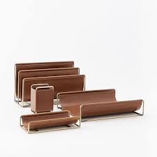 The modern unlined valet tray is a convenient catchall and the modern desk pad has room for your laptop and more, making them both excellent leather desk organizers. Faux Leather Brass Desk Accessories