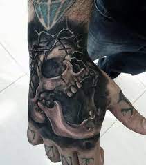 This tattoo includes a black and white. Top 41 Badass Hand Tattoos For Men 2021 Inspiration Guide