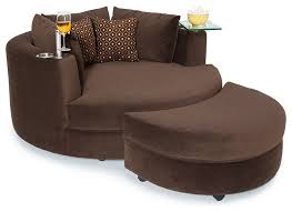 Brown Round A Chair And Half With Glass Tray Holder In The Left Adn Cupholder In The Right And Two Accent Pillow Cuddle Couch Home Theater Seating Cuddle Chair