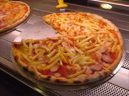 a pizza with hot dog and french fry topping taken in sorrento italy no kidding food french fry toppings recipes
