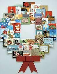 To try this fresh way to show off holiday cards, wrap a straw wreath form with upholstery webbing (available at fabrics stores), securing it in place with small, concealed sewing pins. 14 Neat Ways To Hang Your Christmas Cards This Holiday