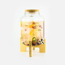 Use a hole punch to make an opening in the center of your mason jar lid, then use cuticle scissors to make it wide enough to pop in a soap dispenser pump. Dalisay Mason Jar Drink Dispenser With Wooden Stand Kiyolo