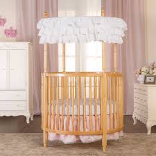 The sheets are easy to fit to the round crib, so changing the bedding is simple. Round Oval Cribs Find The Most Stunning Round Crib Nursery Kid S Room Decor Ideas My Sleepy Monkey