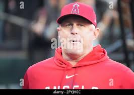 Los Angeles Angels manager Phil Nevin talks with first base umpire Lance  Barrett, right, in the third inning of a baseball game against the Texas  Rangers, Monday, June 12, 2023, in Arlington,