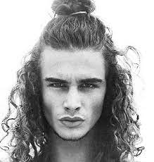 Man Bun Hairstyle Guide For Curly Hair Men Man Bun Hairstyle Long Curly Hair Men Curly Hair Men Man Bun Hairstyles