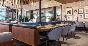 Bar featuring a massive space with an open concept kitchen, spacious dining room and amazing patio with epic views. Earls Kitchen Bar Restaurants
