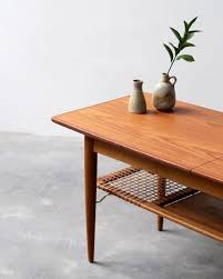 This piece features gently curved sides with upturned edges, an interesting leg structure and beautiful teak wood grain. Best Vintage Coffee Tables In 2021 Coffeespiration In 2021 Danish Coffee Table Coffee Table Vintage Coffee Table