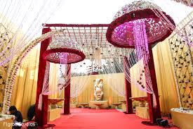 If you are looking for south indian decor and your approach to wedding decoration is traditional, then a stage like this one looks absolutely magnificent. Indian Wedding Outdoor Decorations