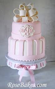 Enjoy these baby shower cakes associated with baby shower, which happens when people present gifts to the mother who has just given birth to her child. Pink Baby Shower Cake Elegant Monogram Bow Stripes Pink Baby Shower Cake Baby Shower Cakes Girl Baby Shower Cakes