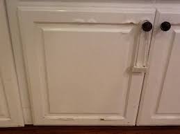 Glidden.com copyright when you can't afford a major kitchen remodel, paint is the most affordable and easy way to change the look and feel of your kitchen cabinets. Water Damage On Press Wood Kitchen Cabinets Wood Kitchen Cabinets Laminate Kitchen Cabinets Laminate Cabinets