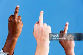 Three Hands Make Obscene Middle Finger Gesture Against Blue Background  Stock Photo - Download Image Now - iStock