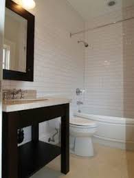 Dramatically Stacked White Tile Tub And Shower By Bright Design Lab In Portland Or Inspiration Kitchens Pinterest White Tiles Design Lab And Tubs