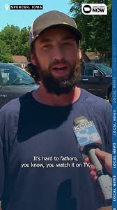 People in Spencer cleaning up after devastating flooding
