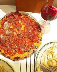 Little Nat S Pizza And Bucatini Pasta With A Glass Of Red At Jon Vinny S In La Travel Food Food Culinary Travel
