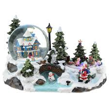 00:43 musical train snow globe with santa and his sleigh, plays several songs. Christmas Village With Snow Globe And Train 15x25x15 Cm Online Sales On Holyart Com