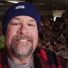 What coating can be used to protect painted carvings from the elements?