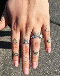 Hand Tattoo Finger Tattoo Birth Symbols Dainty Tattoos Feminine Tattoo Line Tattoo Small Tattoos Studio Hollo Hand Tattoos Finger Tattoos Dainty Tattoos