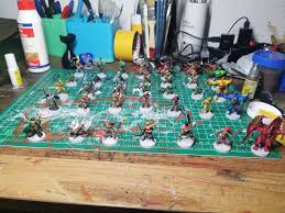 Heroquest for a friend's son. 95 percent speedpaints. Took me 60 to 90  minutes per mini. Should I Drybrush?