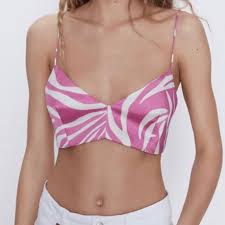 Black and white art glass simmering light with wood grain base. Zara Tops Pink Zebra Bralette Top Poshmark
