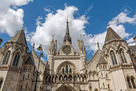 (9) this monument is crowned with a female figure leaning on a upright cross, while its sides are adorned with gothic inlays. Royal Courts Of Justice In The Victorian Gothic Style In London Stock Photo Picture And Royalty Free Image Image 37253779