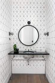 Small Powder Room Ideas Black And White Decor With Patterned Wallpaper And Circular Vanity Mirror M Powder Room Small Powder Room Design Black And White Decor