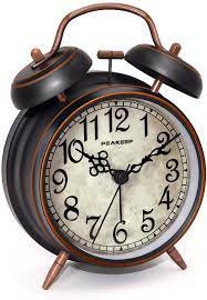 Terrific clock, well thought out. Amazon Com Peakeep Retro 4 Inches Battery Operated Twin Bell Loud Alarm Clock Black With Arabic Kitchen Dining