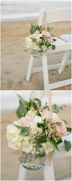 Beach Wedding Ceremony Seating Floral Decor Waxflowers Pink Roses White Stock Fl Wedding Beach Ceremony Beach Wedding Flowers Wedding Ceremony Decorations
