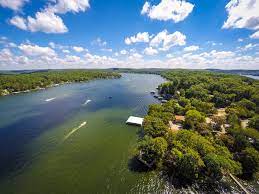 The lake of the ozarks, impounded by the bagnell dam on the osage river, has an area of 93 square miles (241 square km) and a shoreline of some 1,375 miles (2,200 km); Fun Facts You Might Not Know About Lake Of The Ozarks