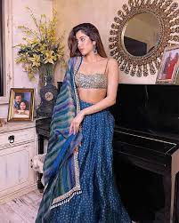 Divya kumar & asees kaur: Steal Janhvi Kapoor S Glam Look In A Teal Arpita Mehta Lehenga For Your Sangeet Weddingsutra