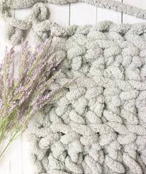 I want to make my 1st hand knit blanket. How To Make Diy Chunky Knit Blanket Arm Knit Or Finger Knit Craft Mart
