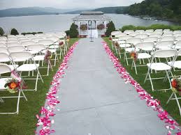 Ceremony Aisle With Pink Rose Petals And Bright Color Floral Chair Accents Wedding At The Candlewood Inn Floral Chair Wedding Flowers Rose Petals