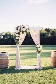 Rustic Wedding Decor White Wooden Arch Decorated With White Cloth And Flowers Surrounded By Wine Country Wedding Country Wedding Inspiration Hydrangeas Wedding