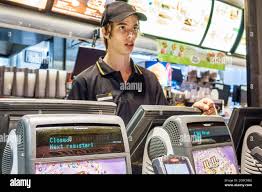 Fast Food Worker Cash Register High Resolution Stock Photography And Images Alamy